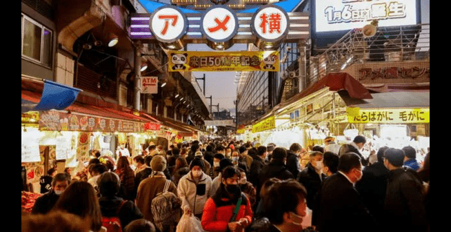 Japan's population falls while foreign residents rise to Record